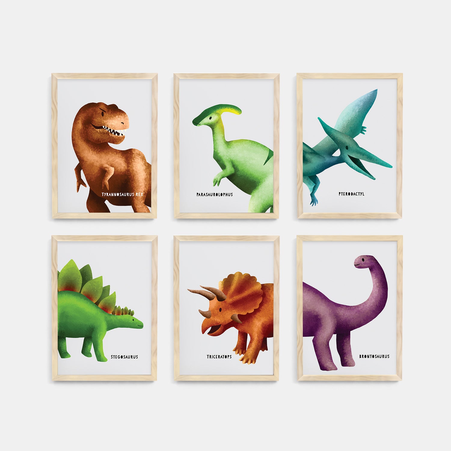 Set of six framed dinosaur nursery and kids wall art prints on a white background - Bluish Nest Art Studio