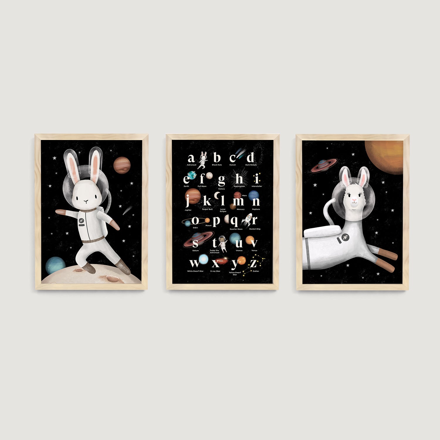 Three framed nursery and children's wall art prints of a space-themed rabbit and llama with an alphabet chart - Bluish Nest Art Studio