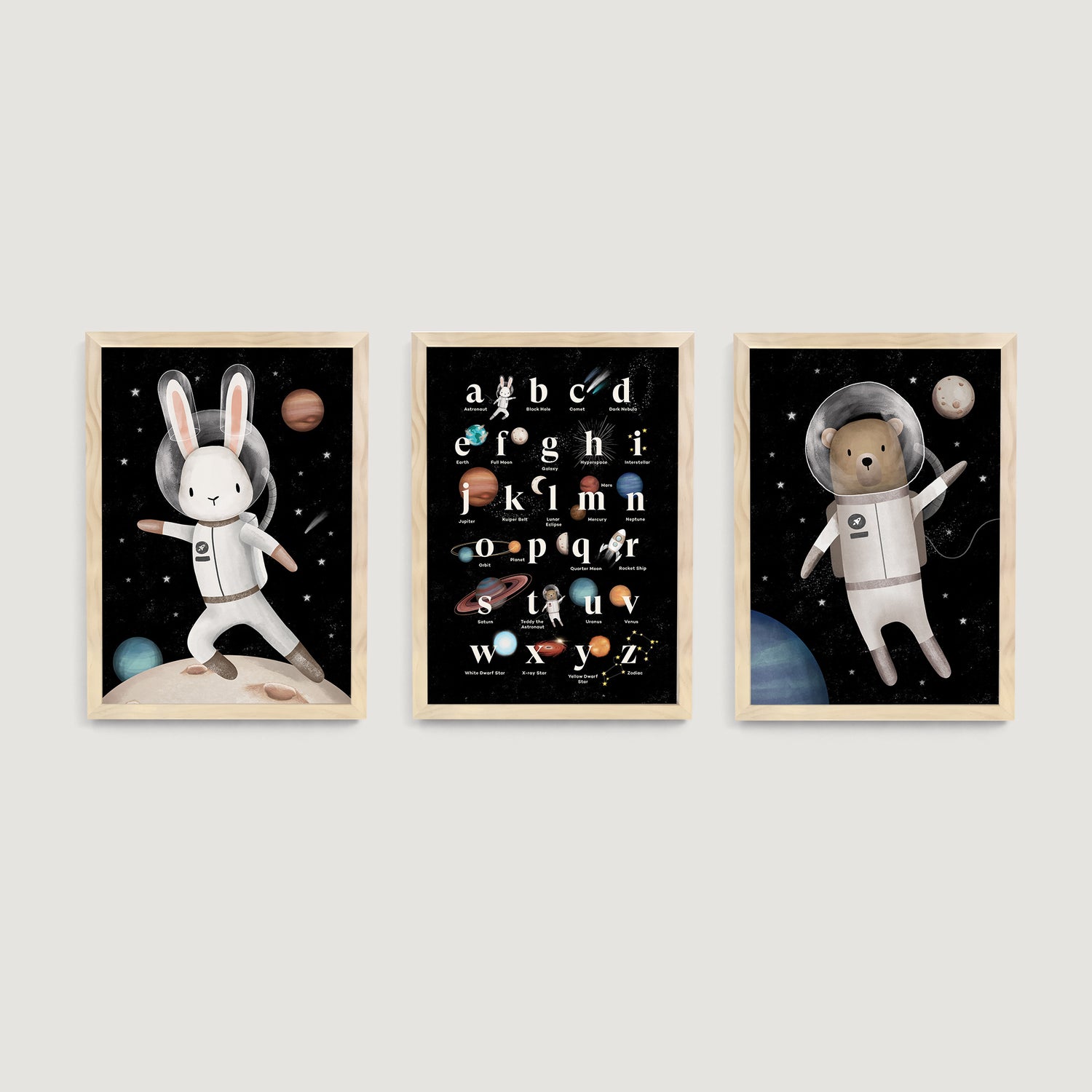 Three framed nursery and kids wall art prints of space-themed animals with an educational alphabet poster - Bluish Nest Art Studio