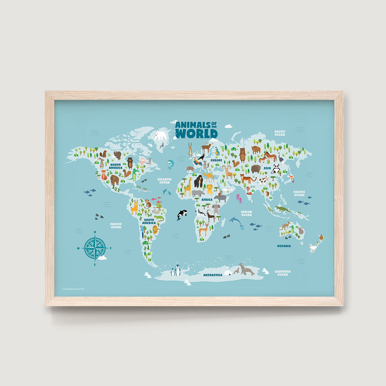 World map nursery kids art print with animal illustrations in a wooden frame on a light gray background background