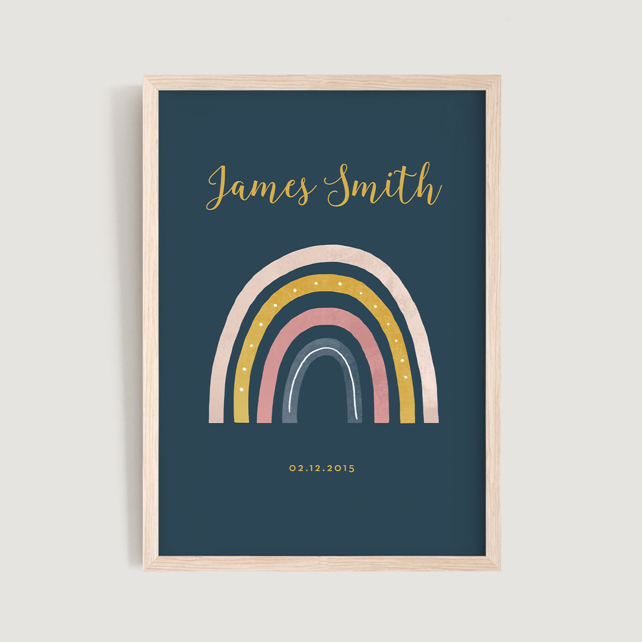 A framed personalised birth baby and kids wall art print of a rainbow with gold text in blue background - Bluish Nest Art Studio