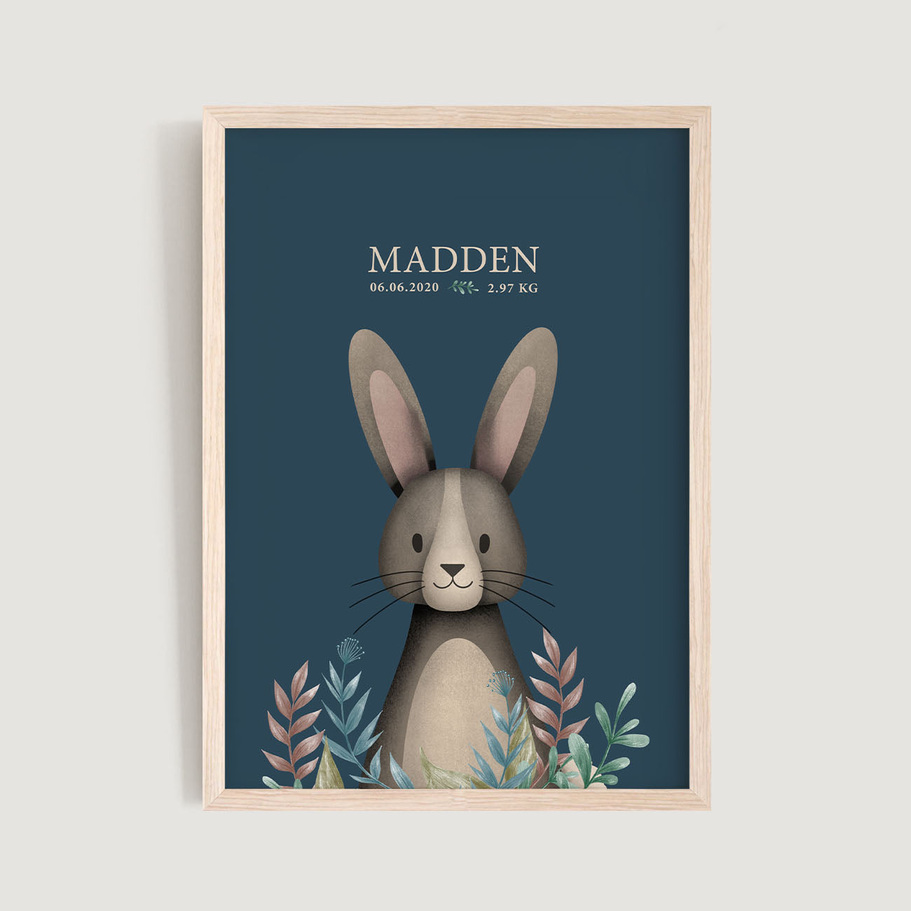 A framed personalised birth baby and kids wall art print of a woodland rabbit with leaves and text in blue background - Bluish Nest Art Studio