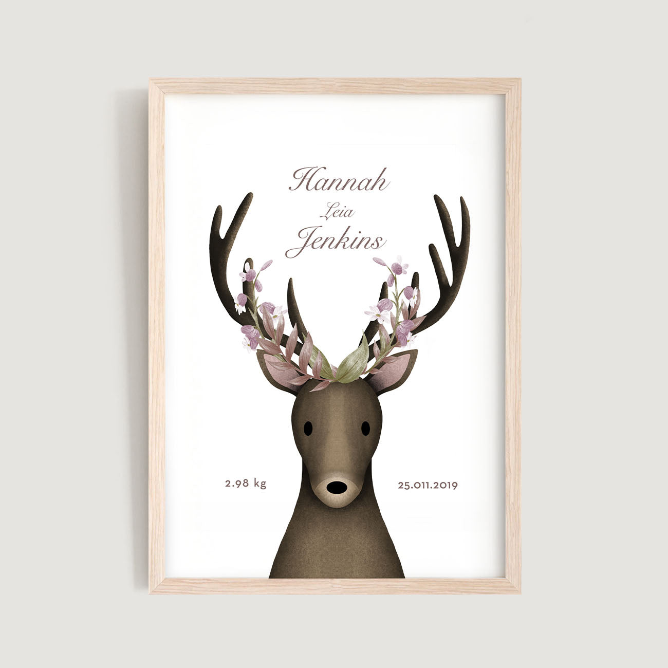 A framed personalised birth baby and kids wall art print of a woodland stag or deer with floral headpiece and text in white background - Bluish Nest Art Studio