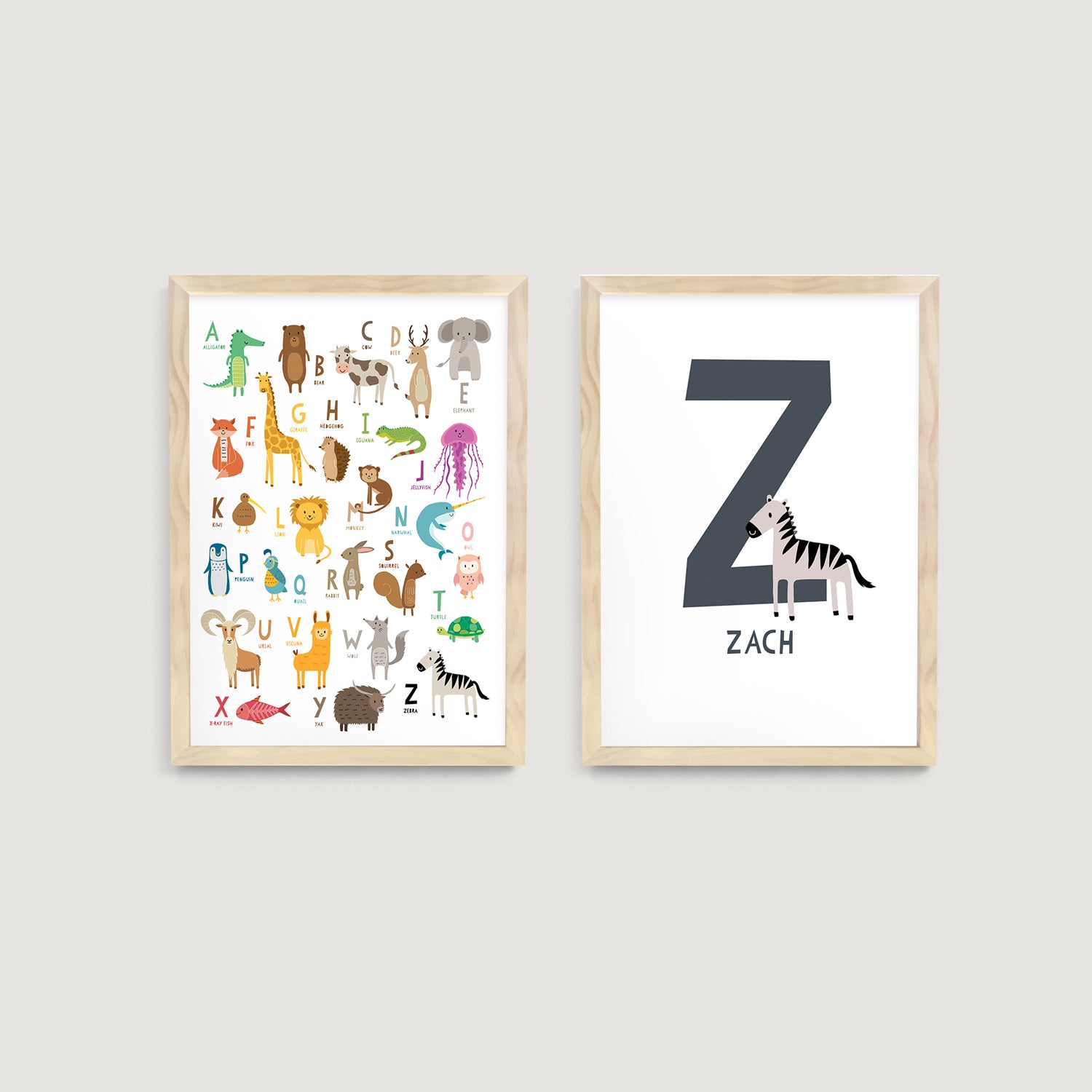 Two nursery framed prints on a white wall, one with a colorful animal alphabet  print and  the other one a personalised name letter print 'Z' and zebra illustration - Bluish Nest Art Studio