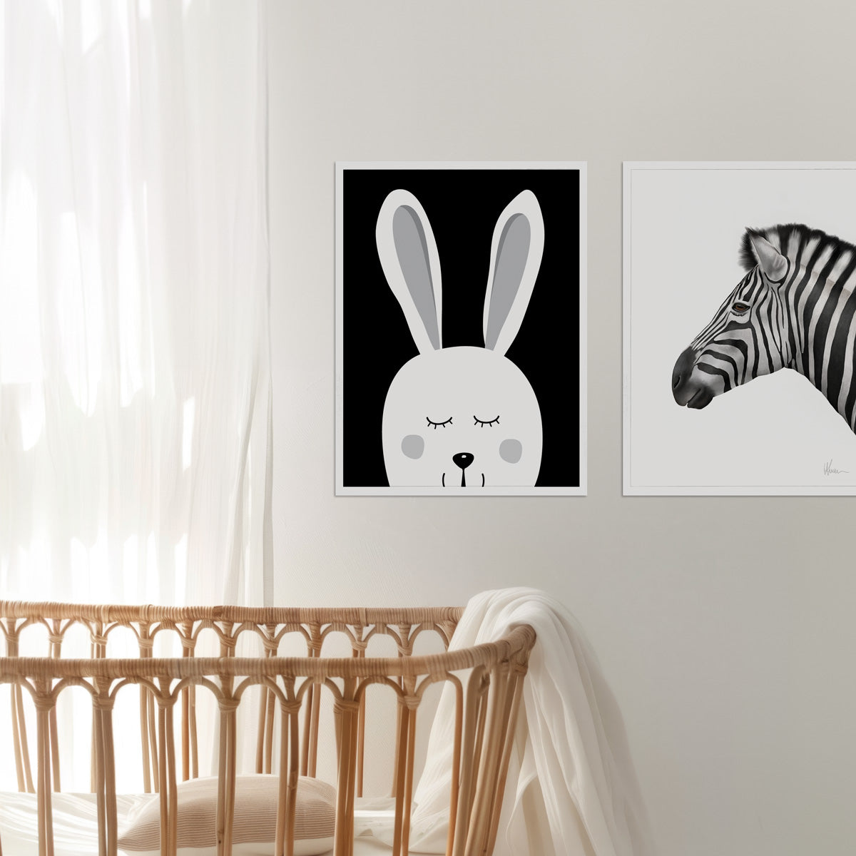 Framed kids and baby wall art prints of a rabbit and zebra on a wall above a crib in a baby or nursery room - Bluish Nest Art Studio